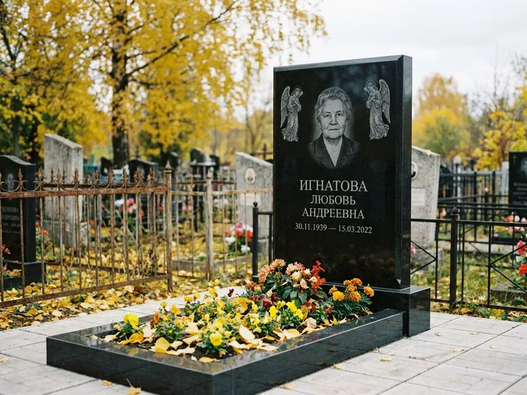 Памятник с гравировкой ангела — гравировка двух ангелов по сторонам портрета, работа «Игнатова» в Ставрополе