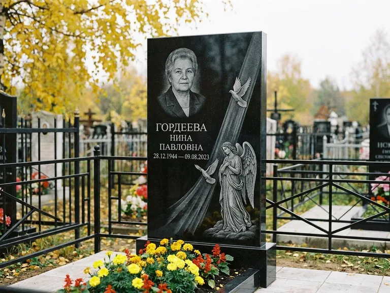 Памятник с гравировкой ангела — гравировка ангела с голубем по диагонали стелы, работа «Гордеева» в Ставрополе