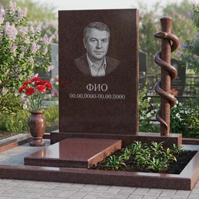 Гранитный памятник врачу с символом медицины