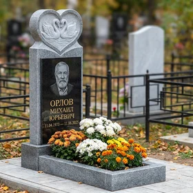 памятник с лебедем из мансуровского гранита с портретом и фигурной стелой